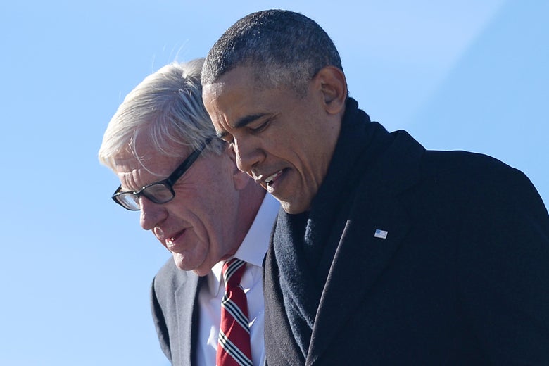 US President Barack Obama and Rep Brad Ashford, Republican from Nebraska, step off Air Force One upon arrival at Offutt Air Force Base near Omaha, Nebraska on January 13, 2016. / AFP / MANDEL NGAN (Photo credit should read MANDEL NGAN/AFP/Getty Images)